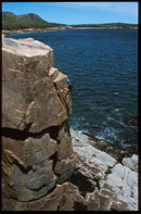 Matt rappels down to the base of a climb.